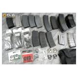 AR-15 rifle magazines and scope rings. Total of 19