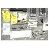 Assorted firearm components including 1911 and Gei
