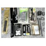 Assorted firearm accessories and parts. Good Condi