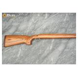 One laminate wood rifle stock. Very Good Condition