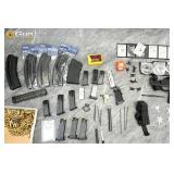 Assorted firearm accessories, knives, and noveltie