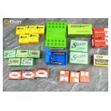 A variety of reloading supplies and projectiles. T