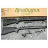 Features two black synthetic stocks, one equipped