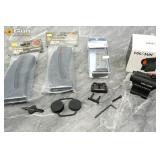 One Holosun optic and three Smith & Wesson mags. E
