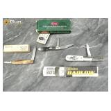 Three assorted pocket knives in their original box