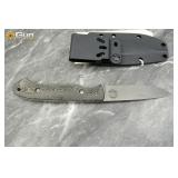 White River fixed-blade knife with a sheath. Excel