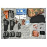 Firearm holsters, pistol cases, and grips. Very Go