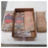 FOUR BAGS OF LEAD SHOT