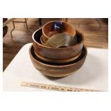 STACK OF HAND MADE WOODEN BOWLS