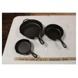 THREE CRACKER BARREL CAST IRON SKILLETS