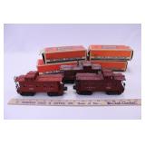 THREE 1948-61 LIONEL #6357 CABOOSES W/ FOUR BOXES