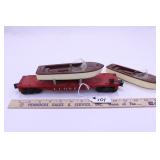 1957-60 LIONEL #6801 FLAT CAR W/ TWO BOATS