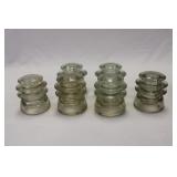 SIX CLEAR GLASS INSULATORS