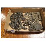 FLAT OF CAST IRON TRIVETS INCL. GRISWOLD