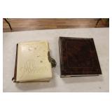 (2) PHOTO ALBUMS (YELLOW ONE HAS DAMAGE)