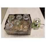 FLAT OF GLASS TEAPOT AND STORAGE JARS