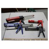 FOUR CAULKING GUNS
