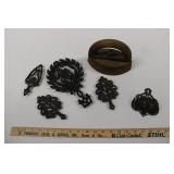 (4) GRISWOLD TRIVETS & SAD IRON