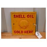 "SHELL OIL SOLD HERE" CAST IRON SIGN