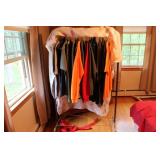 TWO CLOTHING RACKS W/ CONTENTS