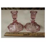 PAIR OF PINK GLASS CANDLESTICK HOLDERS