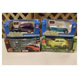 (4) TOY CARS IN BOXES