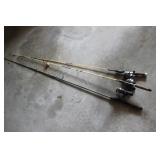 (3) FISHING POLES W/ REELS