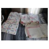 STACK OF BLANKETS AND QUILTS