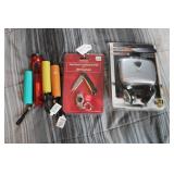 KNIFE, FLASHLIGHTS, AND CASSETTE STEREO