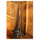 ASSORTED FISHING RODS IN CORNER