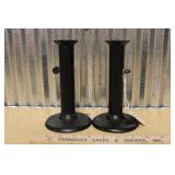 PAIR OF CAST IRON CANDLESTICK HOLDERS