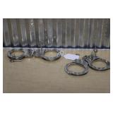 TWO SETS OF HANDCUFFS W/ KEYS