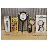 MAGNIFYING GLASSES
