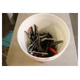 BUCKET OF PLIERS