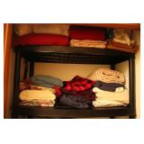 PLASTIC SHELF W/ TOWELS &  LINENS