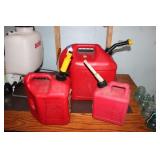(3) GAS CANS W/ GAS - ONE HAS 2 STROKE