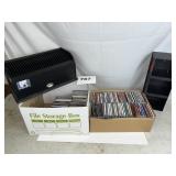 LOT OF CD'S AND STORAGE TOWERS.