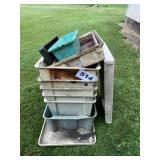 FIBERGLASS TOTES, (1) IS CRACKED ON THE BOTTOM