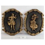 Two Vintage Plastic Framed Man-Woman Plaques