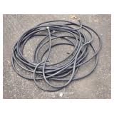 Two Large Black Garden Hoses