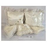 Five White Satin Accent Pillows