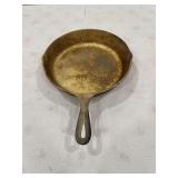 Cast Iron Skillet and Decorative Trivet