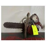 Vintage Red and Gray Chainsaw