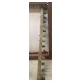 Vintage Glass Insulator Display on Wood Post