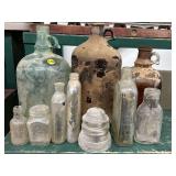 Collection of Glass Bottles and Jugs