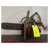 Vintage Red and Gray Chainsaw