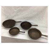 (4) Cast Iron Skillets, 6 1/2", (2) 8", & 9