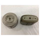 (2) Elkader, Iowa Adv. Metal Banks, (1) Elkader