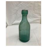 F. Ruskaup, Guttenberg Iowa Embossed Blob Top