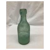 F. Ruskaup, Guttenberg Iowa Embossed Blob Top